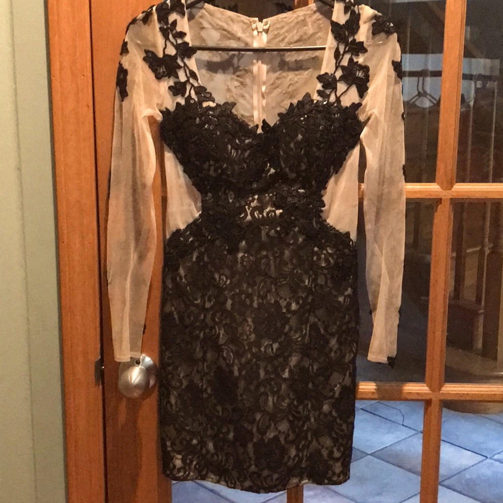 Masquerade fancy women’s dress. Size 5/6. Black sequin overlay on tan mesh.